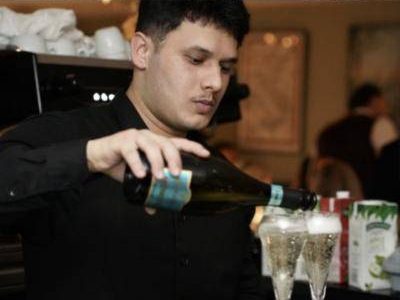 Prosecco being poured at the bar