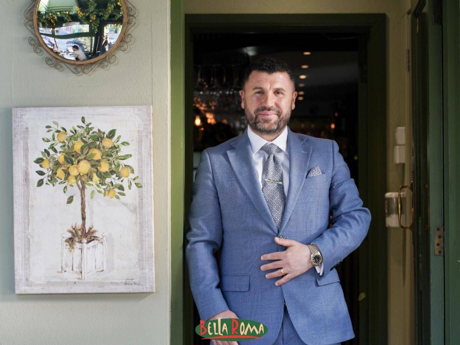 Welcome at the door of Bella Roma