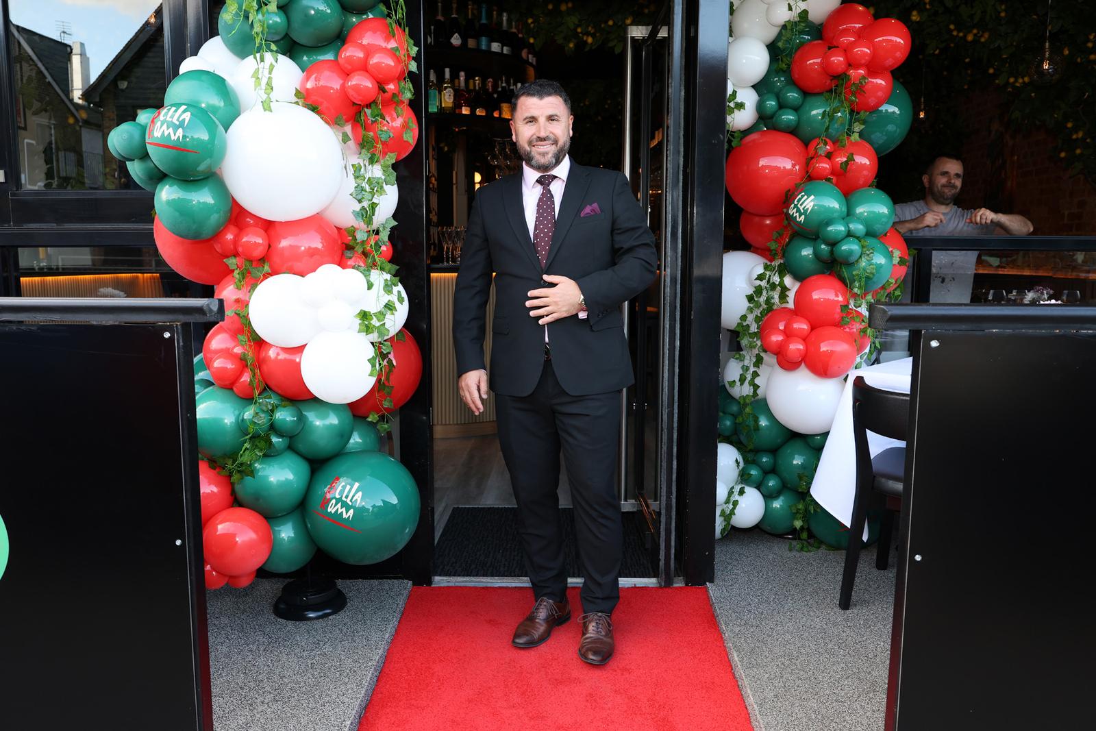 Waiting for the first guests at the door