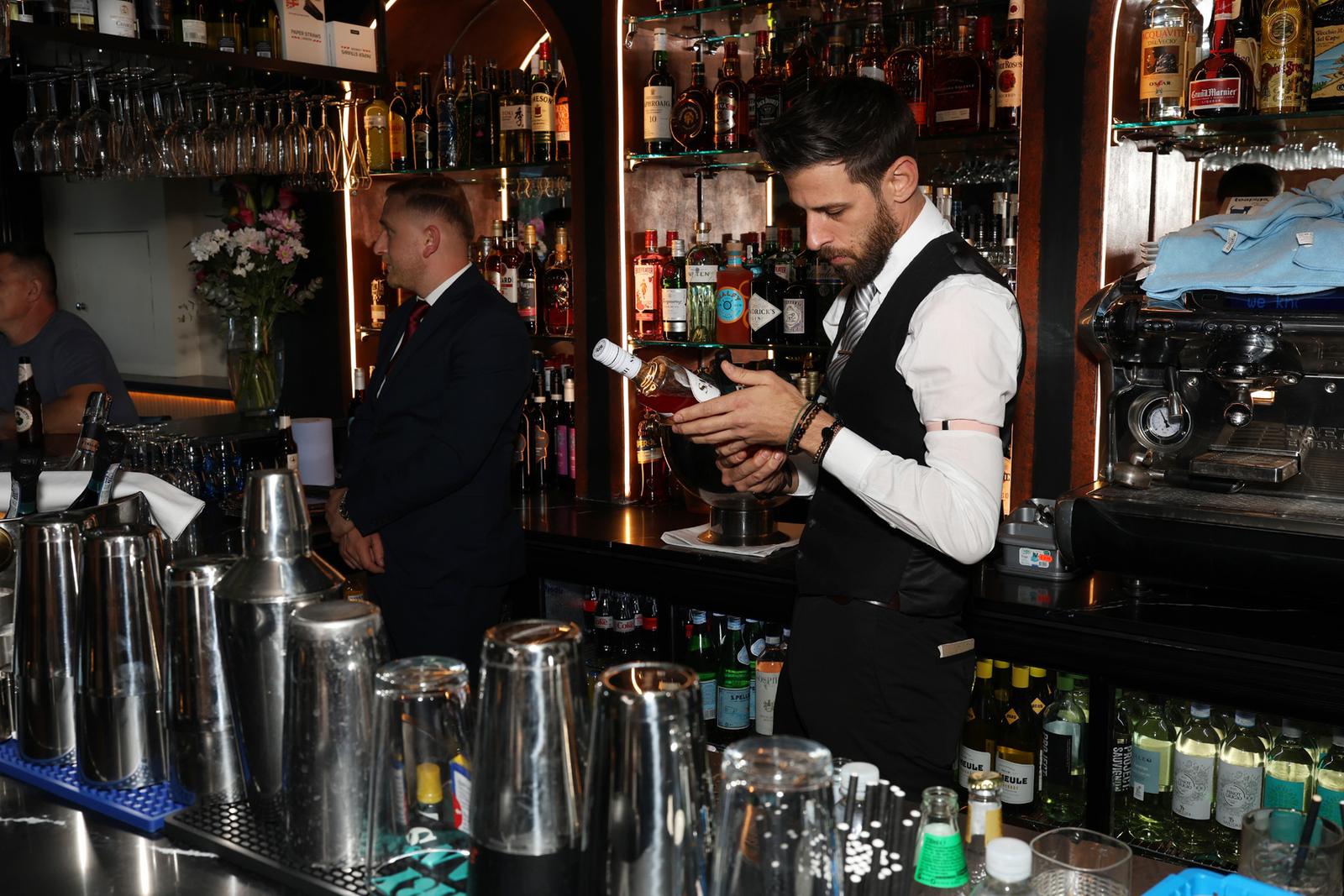 The bartender at work