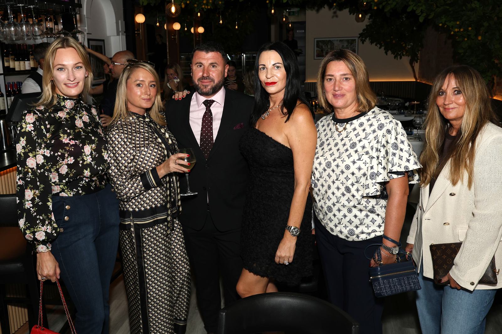 Friends celebrating the opening