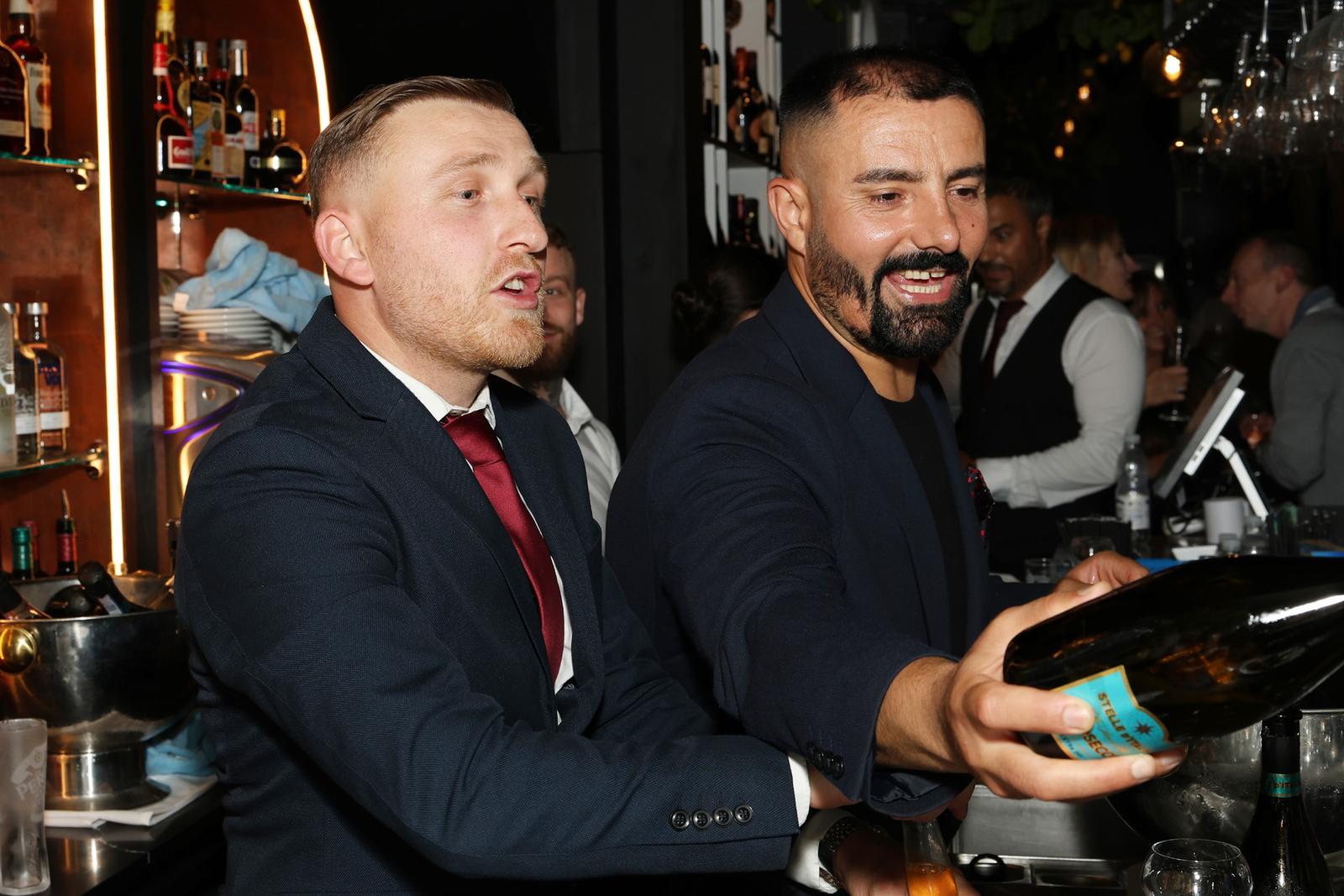 Pouring wine for the guests