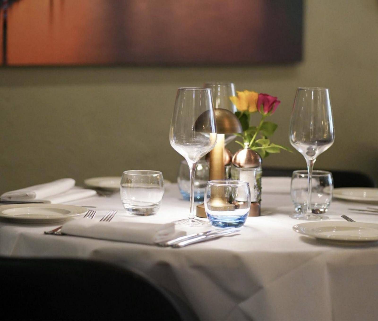 Table laid for dinner at Bella Roma